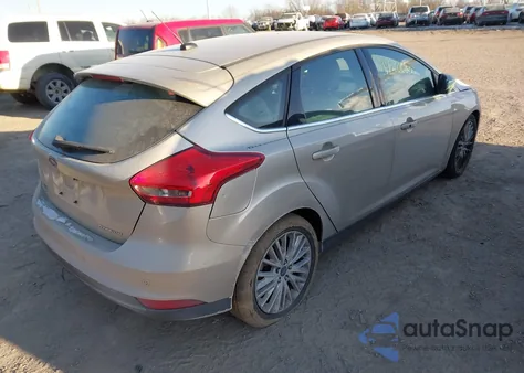 2017 Ford Focus Titanium z USA, uszkodzony, nr VIN 1FADP3N22HL252244